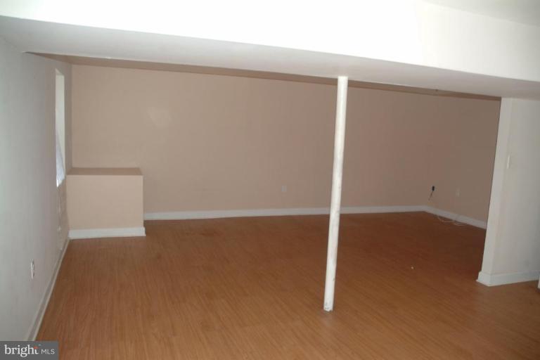 5808 Meridale Road Catonsville, MD 21228 - Photo 9 of 9 an empty room with an empty space