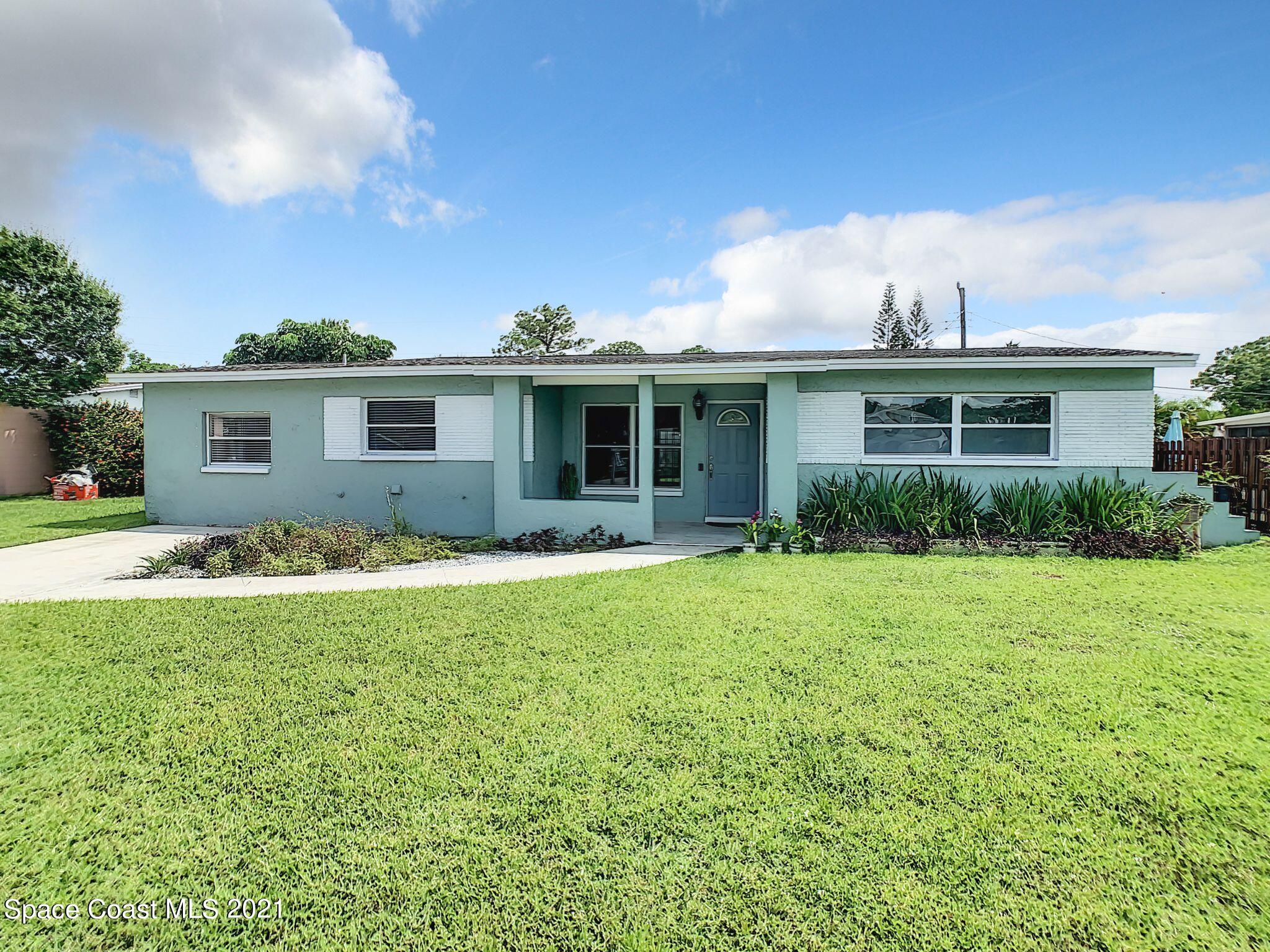 1091 Madrid Road Rockledge, FL 32955 - Photo 2 of 33 a view of outdoor space yard and front view of a house