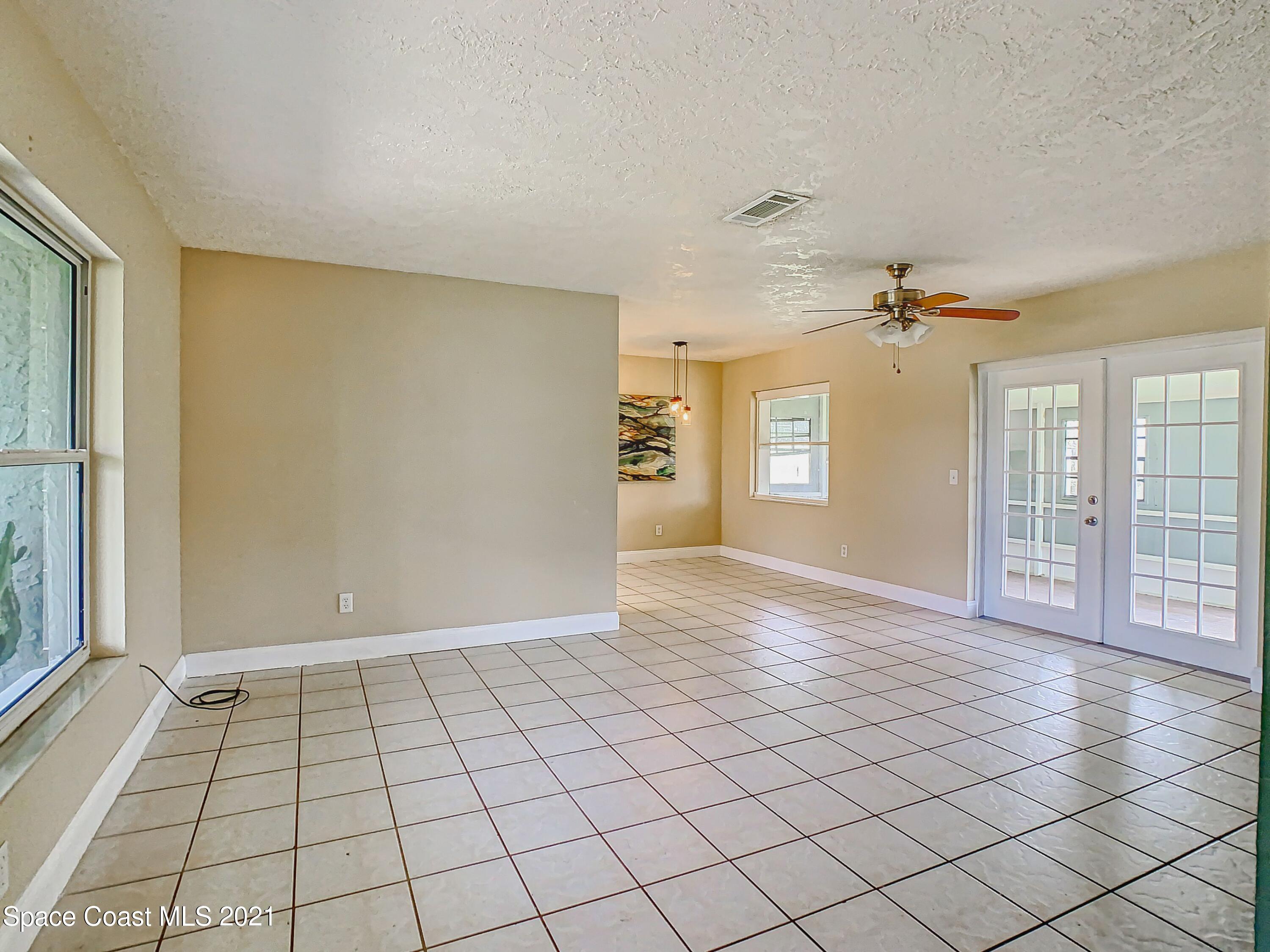 1091 Madrid Road Rockledge, FL 32955 - Photo 32 of 33 a view of an empty room and window