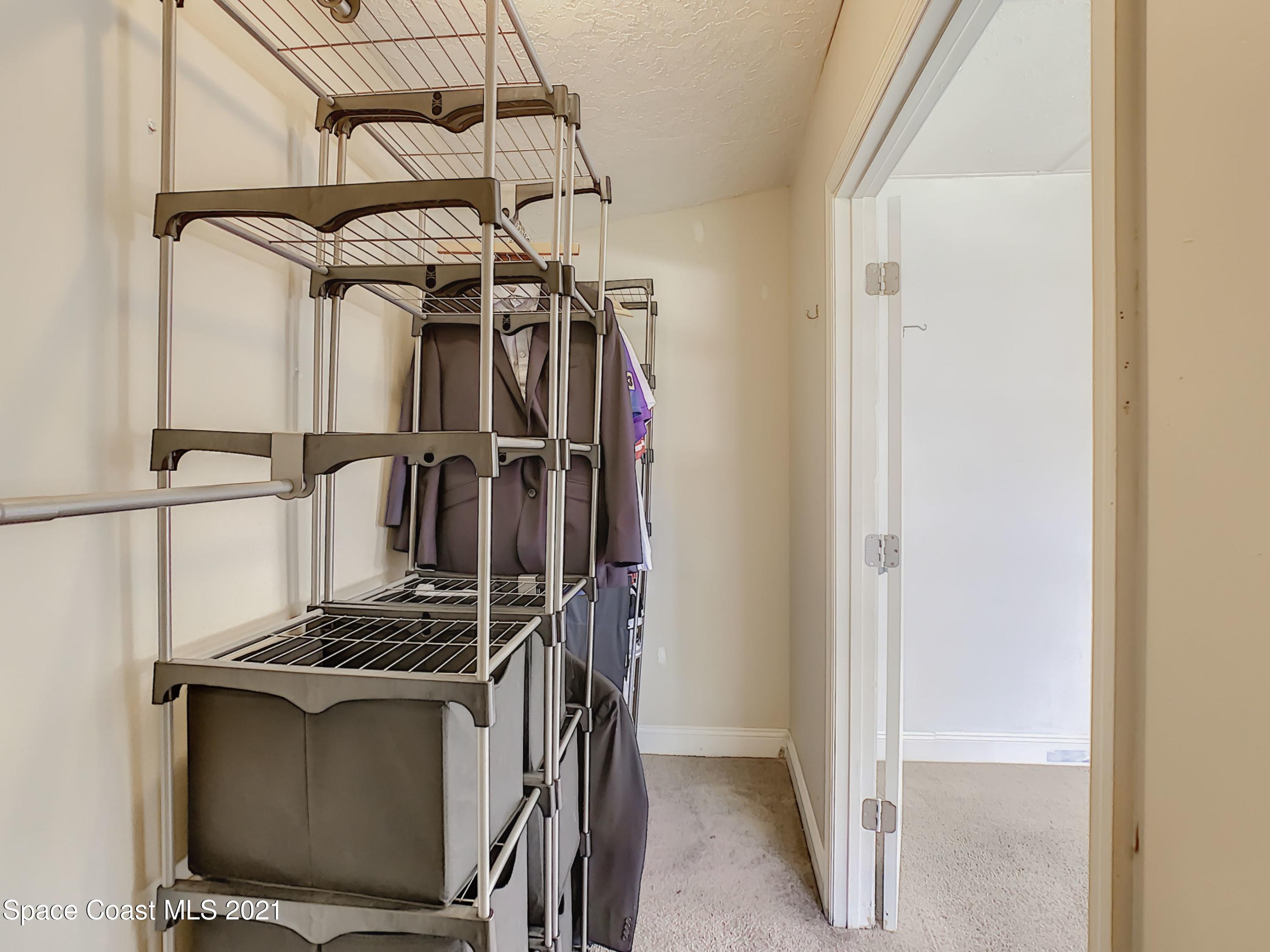 1091 Madrid Road Rockledge, FL 32955 - Photo 17 of 33 a view of storage and utility room