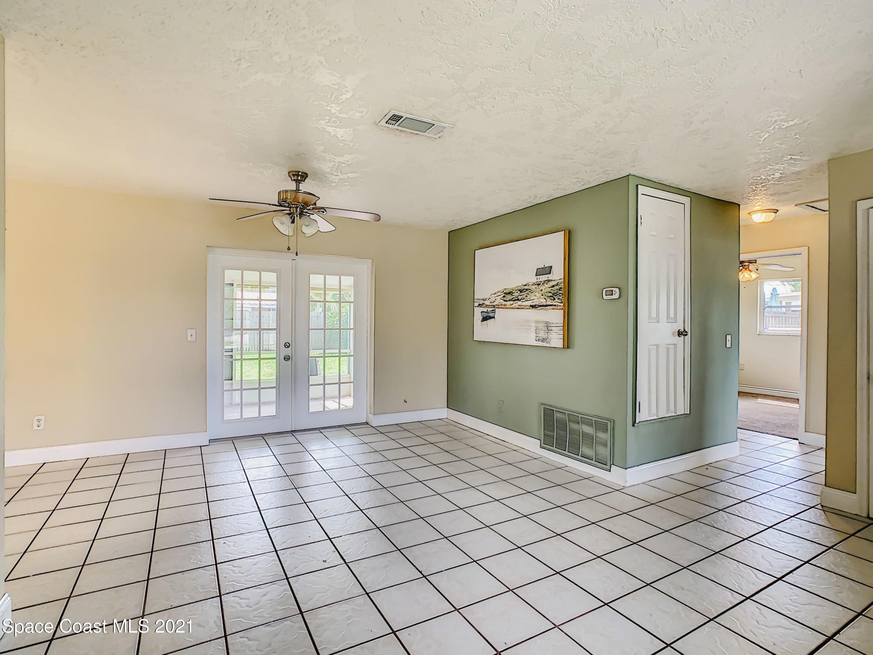 1091 Madrid Road Rockledge, FL 32955 - Photo 33 of 33 a view of an empty room and window
