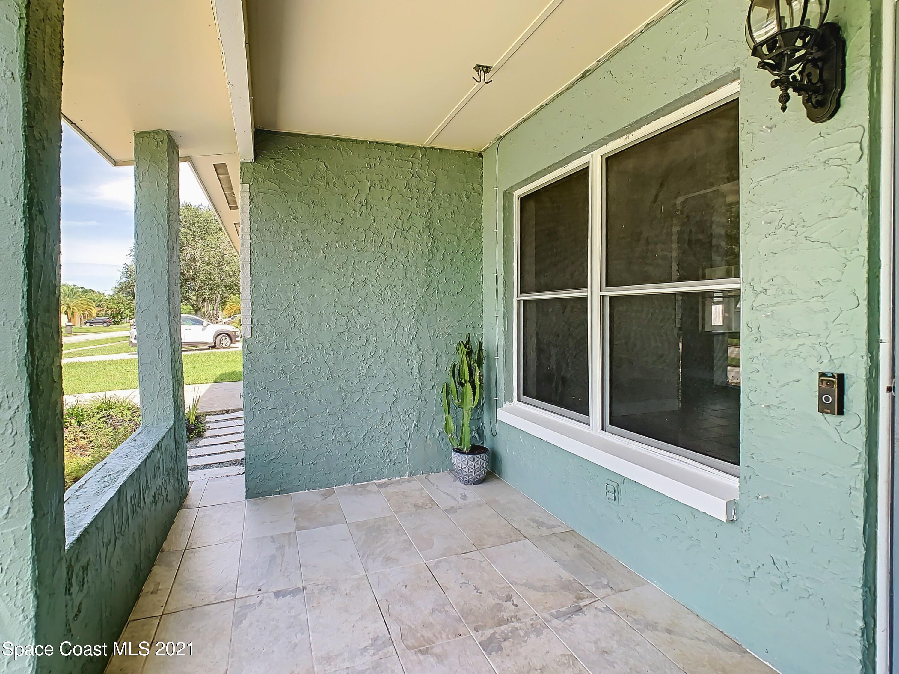 1091 Madrid Road Rockledge, FL 32955 - Photo 5 of 33 a view of an entryway of the house