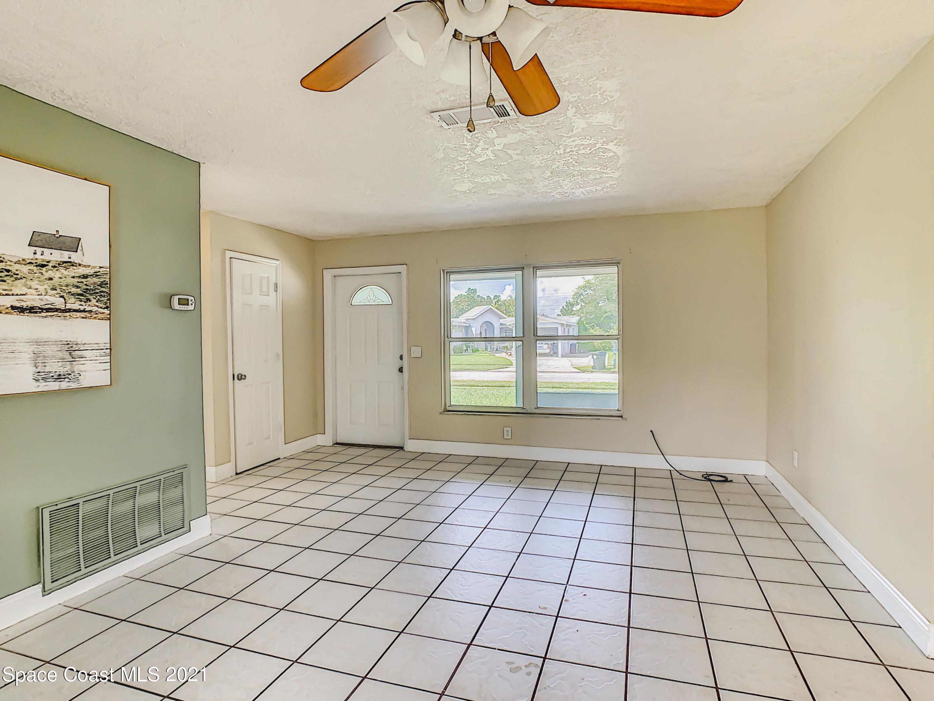 1091 Madrid Road Rockledge, FL 32955 - Photo 7 of 33 a view of an empty room