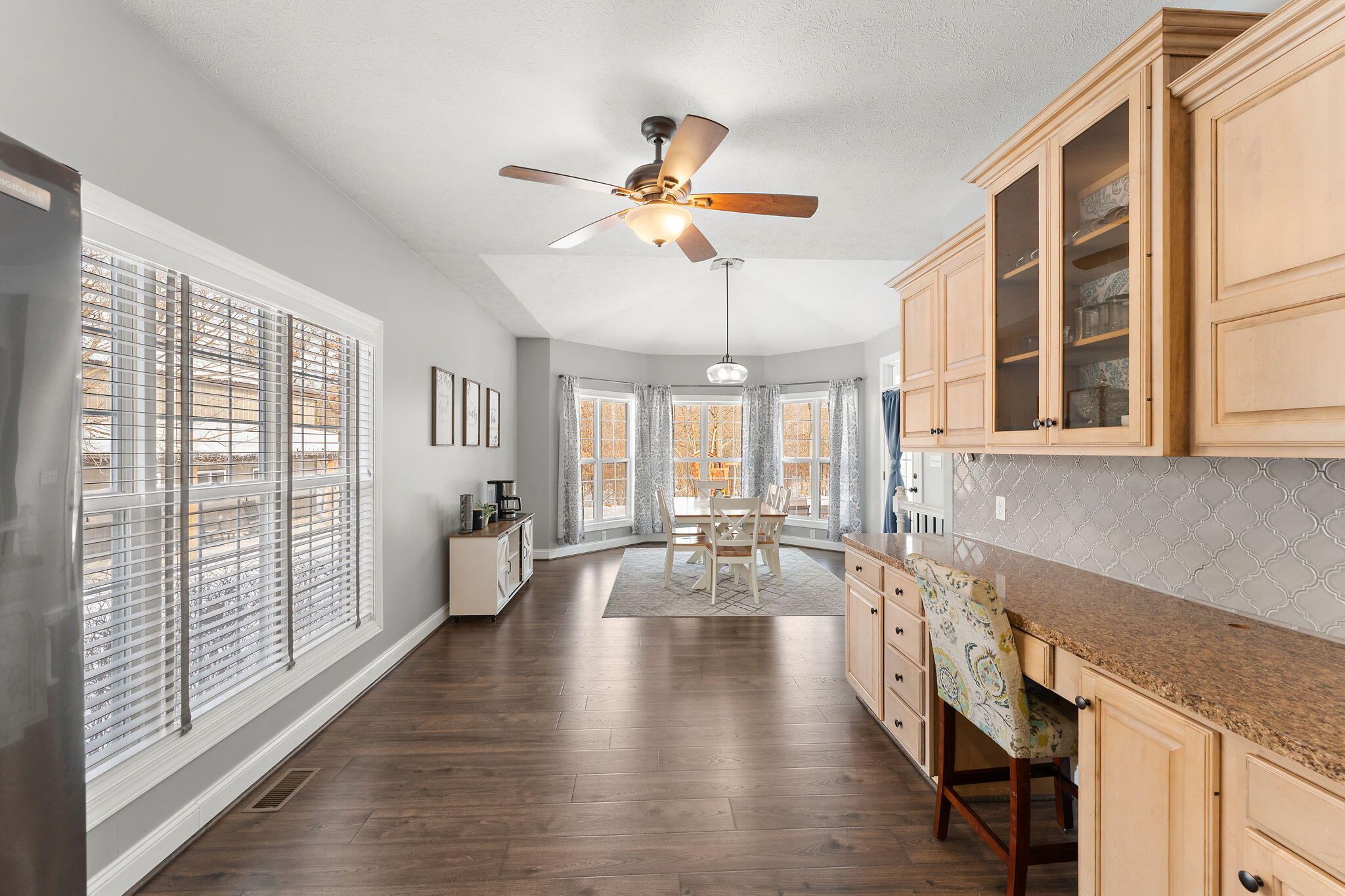 6776 Fox Crossing Knox, IN 46534 - Photo 15 of 53 a living room with furniture large window and wooden floor