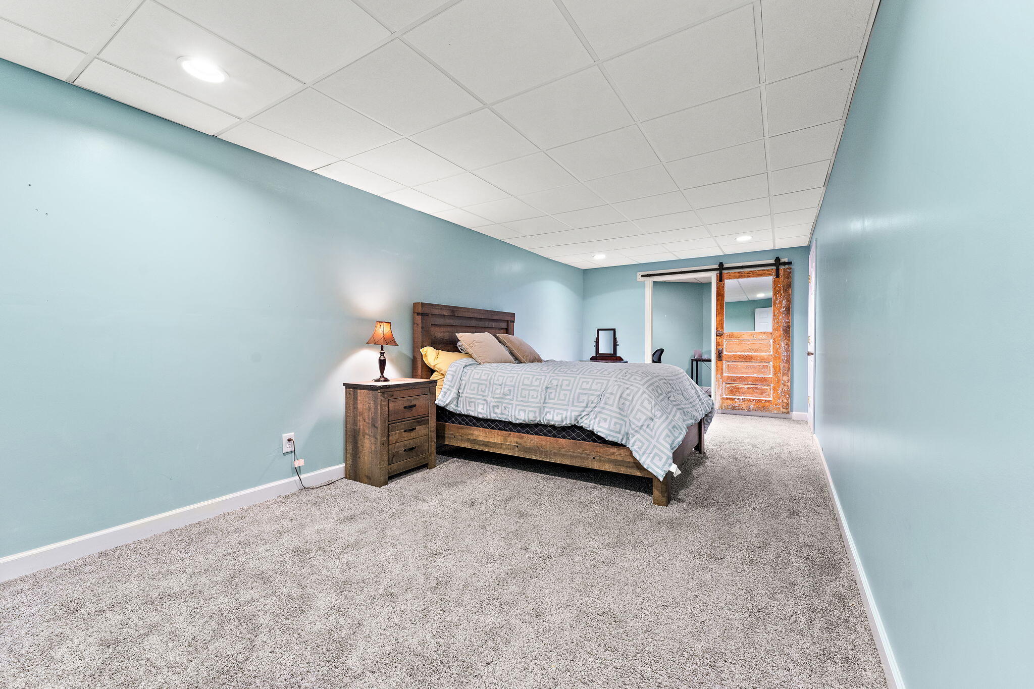 6776 Fox Crossing Knox, IN 46534 - Photo 30 of 53 a bedroom with a bed and a table