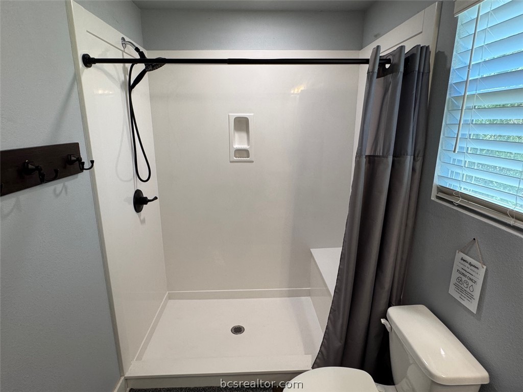 3454 Co Road Marquez, TX 77865 - Photo 23 of 35 a bathroom with a shower and toilet