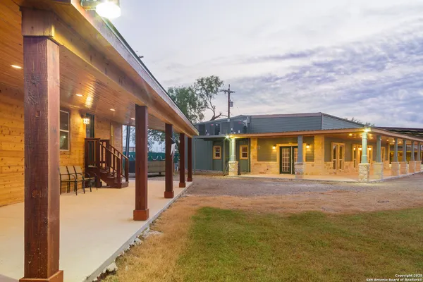 a view of a building with a yard