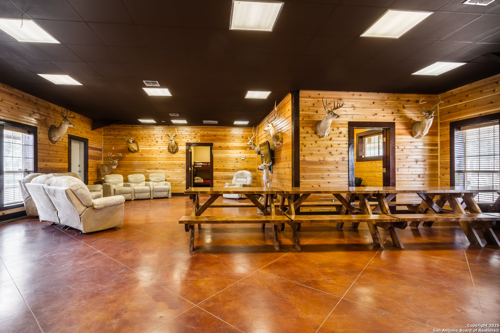 20250 Interstate 35 Access Road Lytle, TX 78052 - Photo 14 of 48 a living room with lots of furniture and a large window