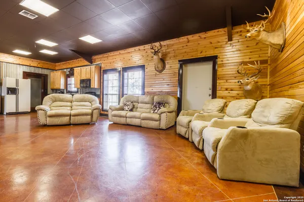 a bedroom with furniture and a couch