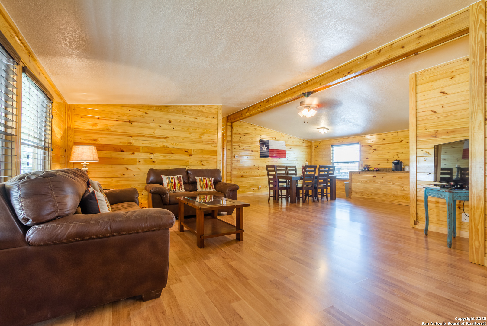 20250 Interstate 35 Access Road Lytle, TX 78052 - Photo 21 of 48 a living room with furniture and wooden floor