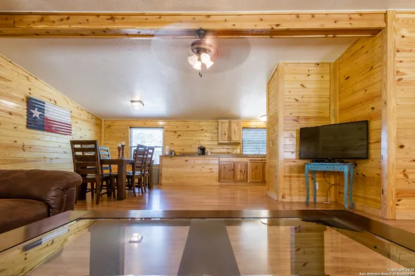a view of a living room and dining room