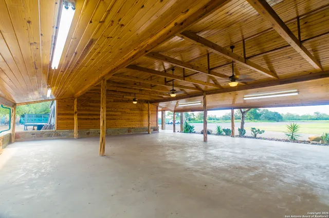 a view of an empty room with a balcony