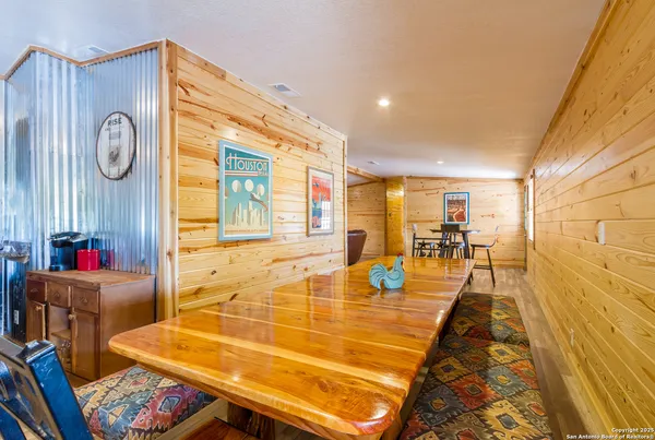 a view of a dining room with furniture