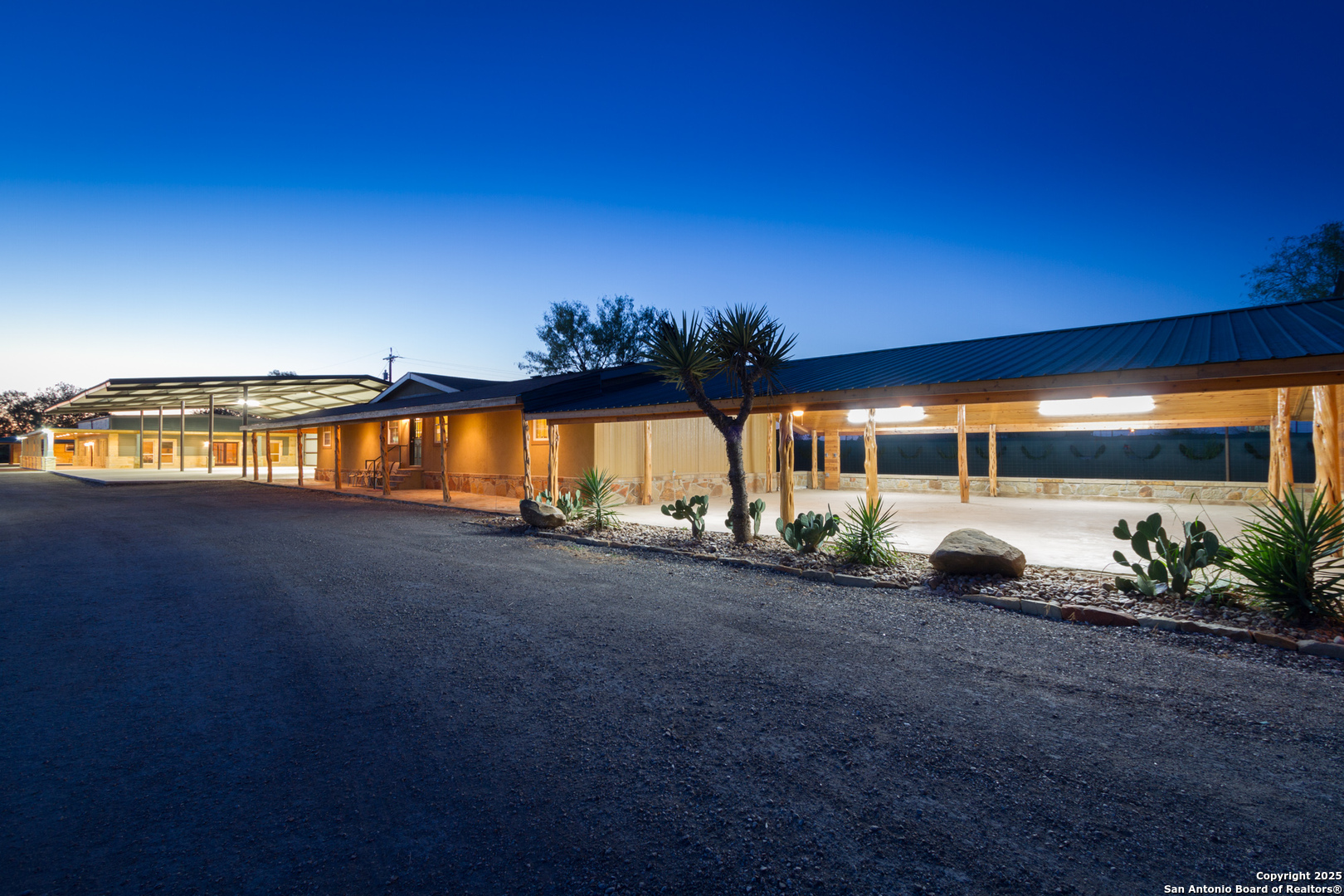 20250 Interstate 35 Access Road Lytle, TX 78052 - Photo 9 of 48 a view of a house with backyard and patio