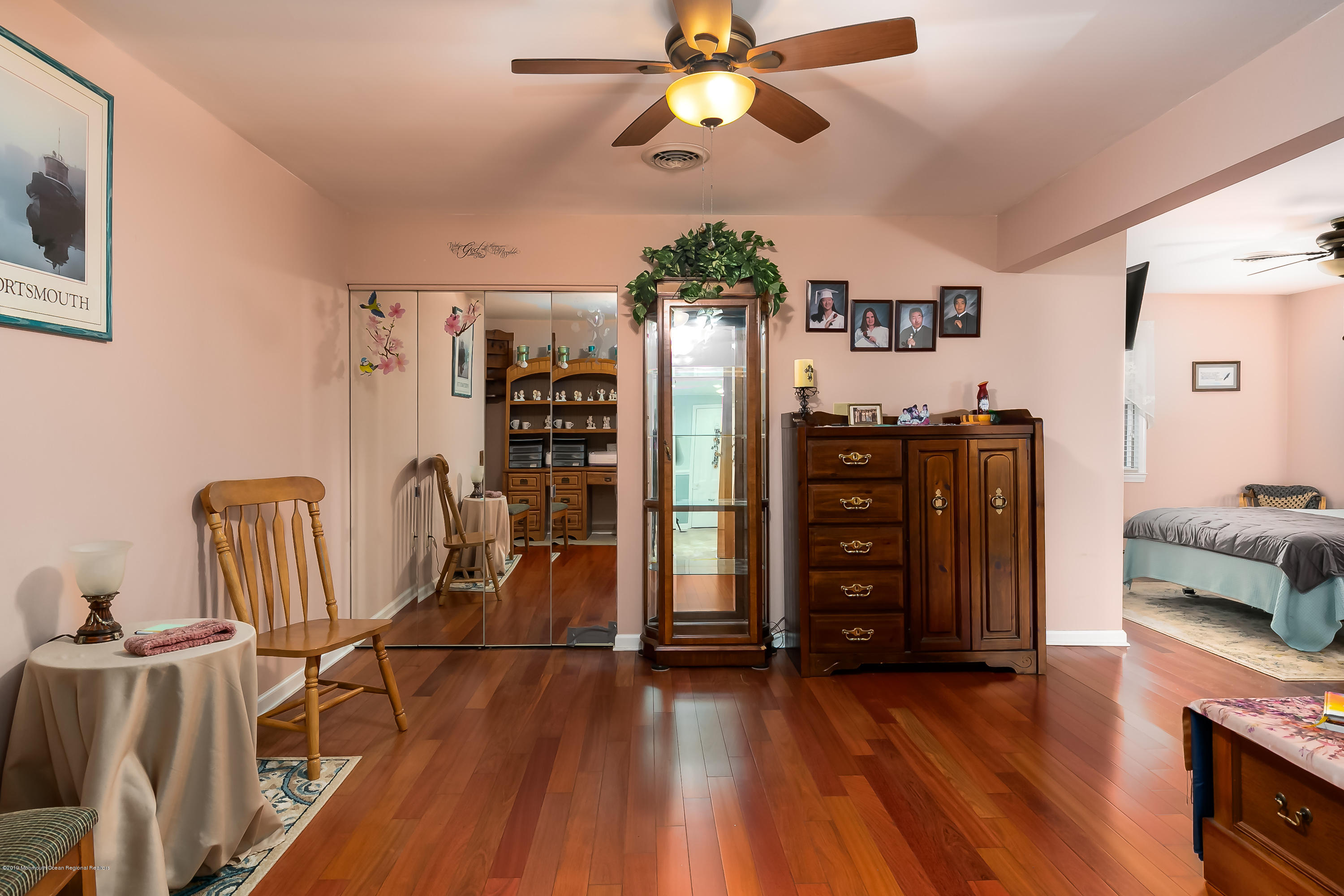 880 Monmouth Road Cream Ridge, NJ 08514 - Photo 19 of 45 a view of a workspace with furniture and wooden floor