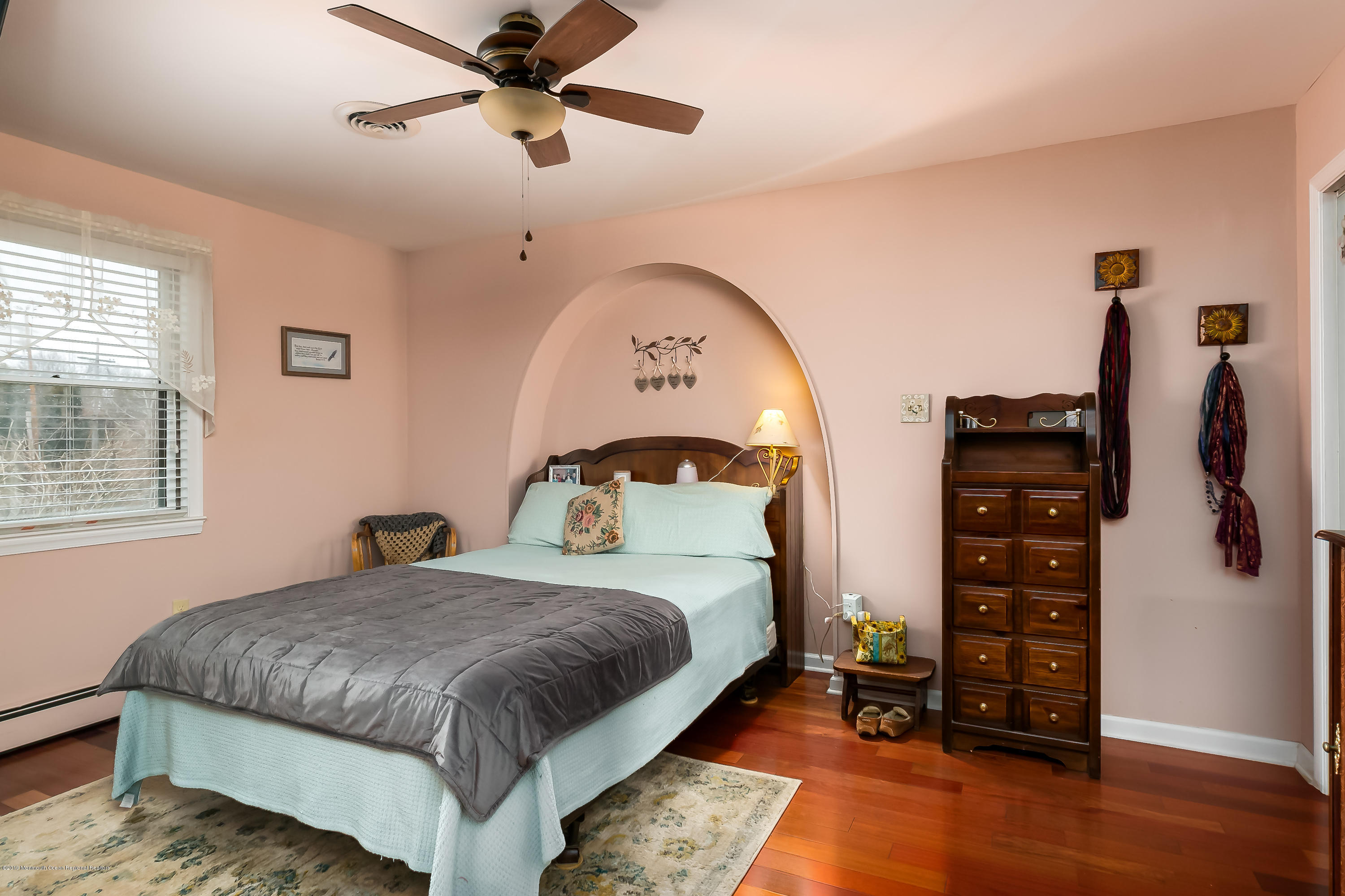 880 Monmouth Road Cream Ridge, NJ 08514 - Photo 20 of 45 a bedroom with a bed and a walk in closet
