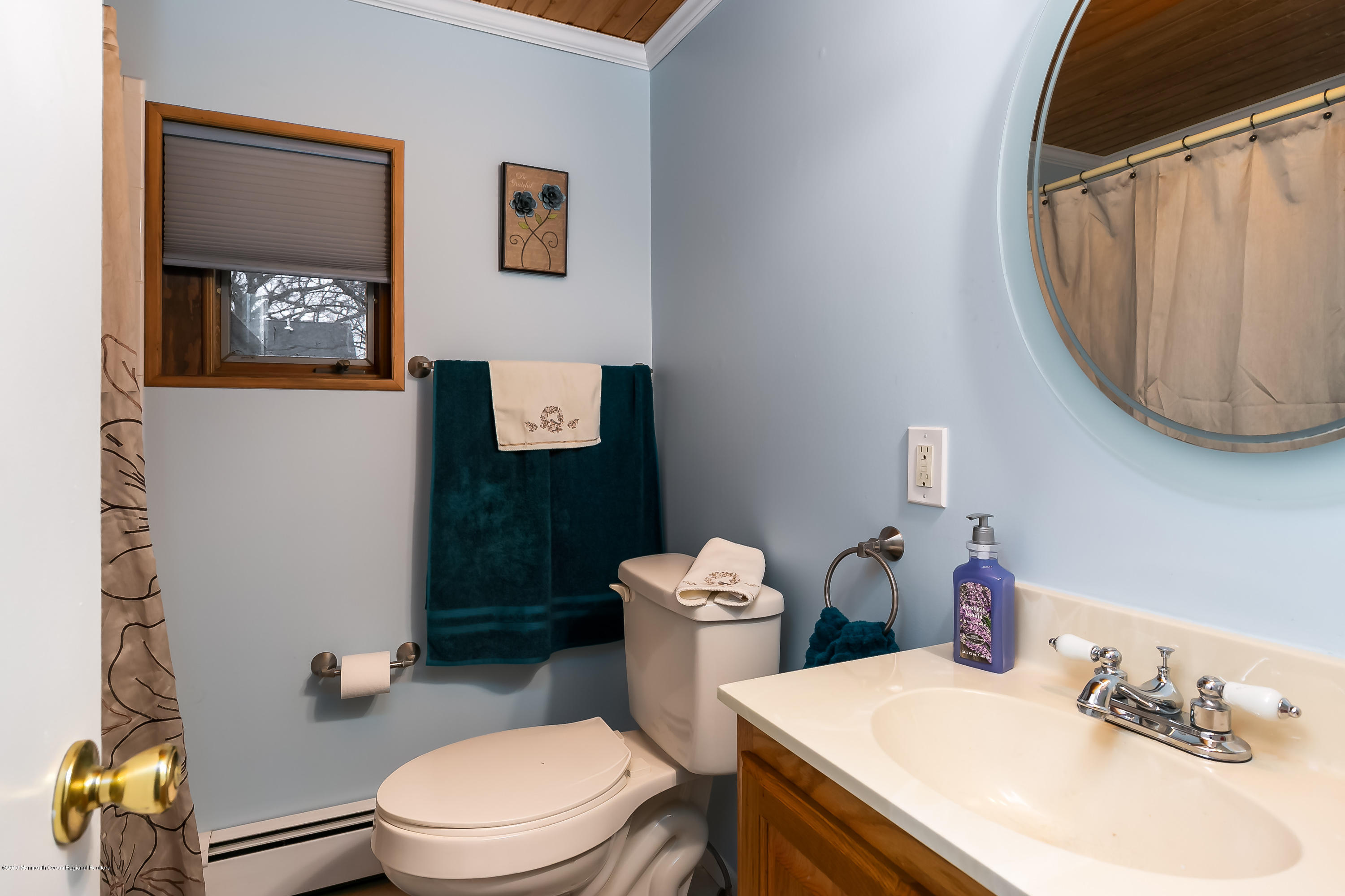 880 Monmouth Road Cream Ridge, NJ 08514 - Photo 22 of 45 a bathroom with a sink mirror and toilet