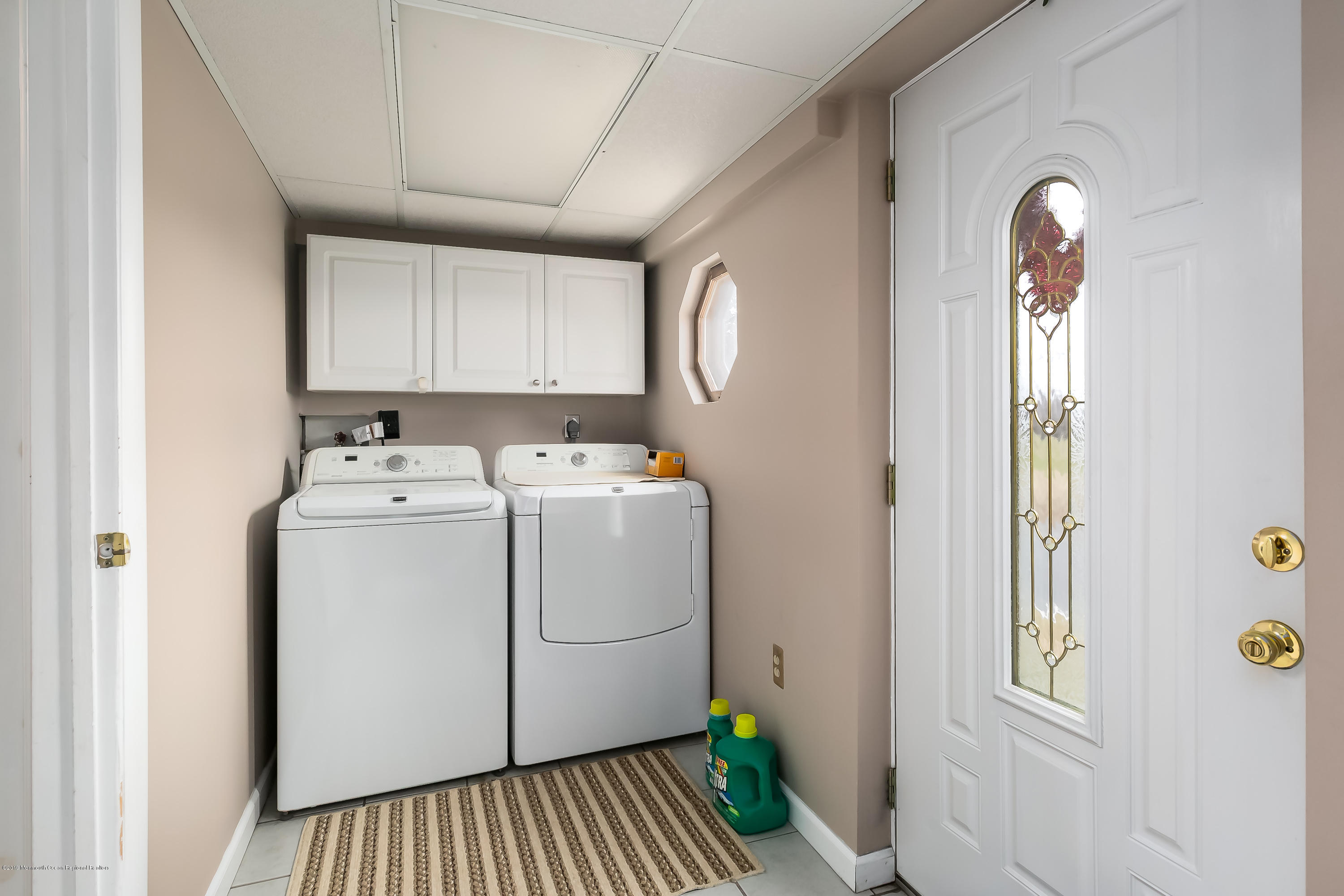 880 Monmouth Road Cream Ridge, NJ 08514 - Photo 24 of 45 a utility room with closet dryer and washer