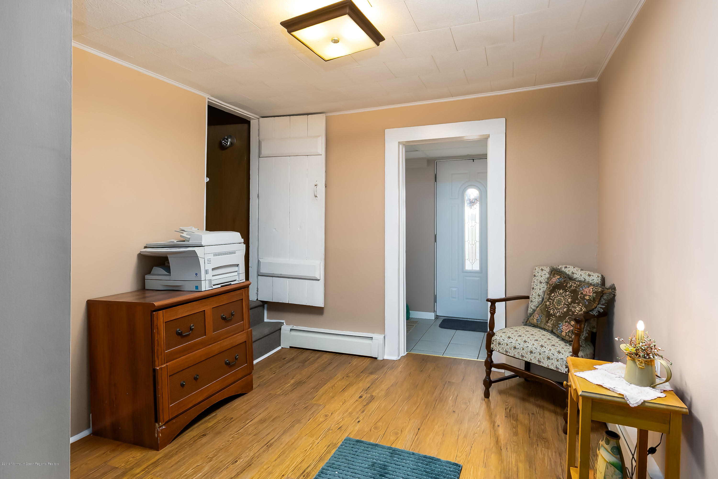 880 Monmouth Road Cream Ridge, NJ 08514 - Photo 25 of 45 a bedroom with a bed and furniture