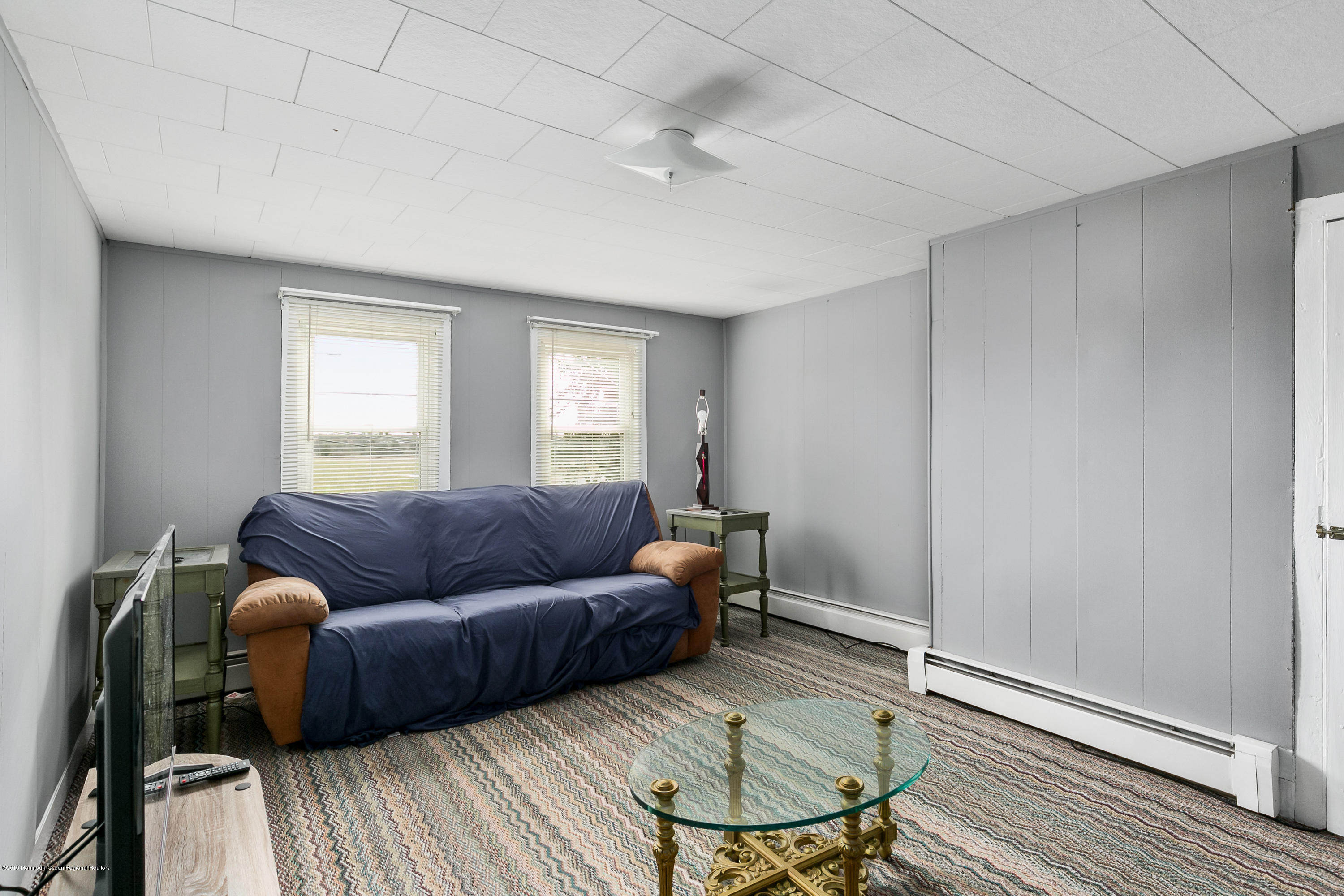 880 Monmouth Road Cream Ridge, NJ 08514 - Photo 29 of 45 a living room with furniture and a window