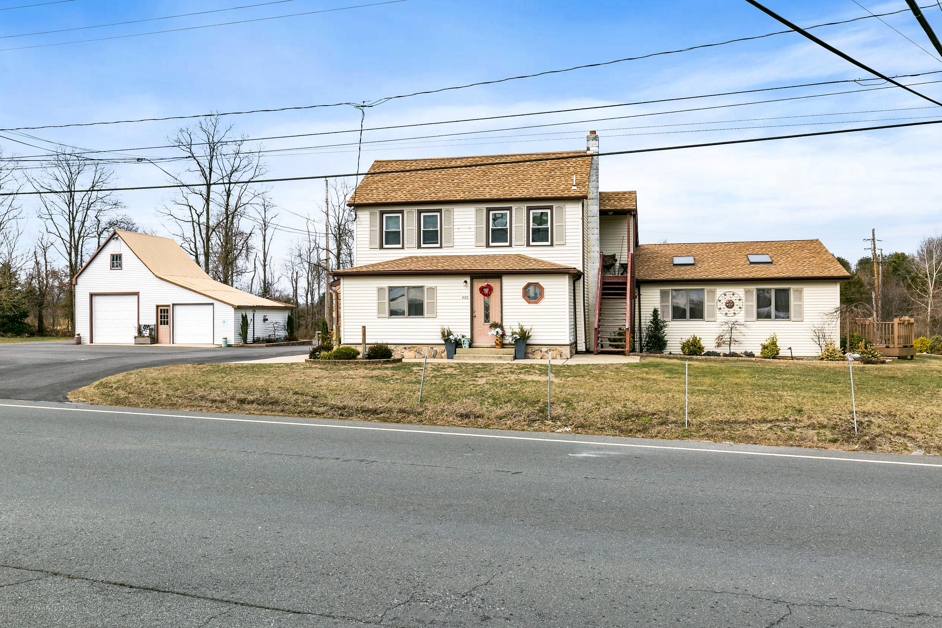 880 Monmouth Road Cream Ridge, NJ 08514 - Photo 3 of 45 a view of house with outdoor space