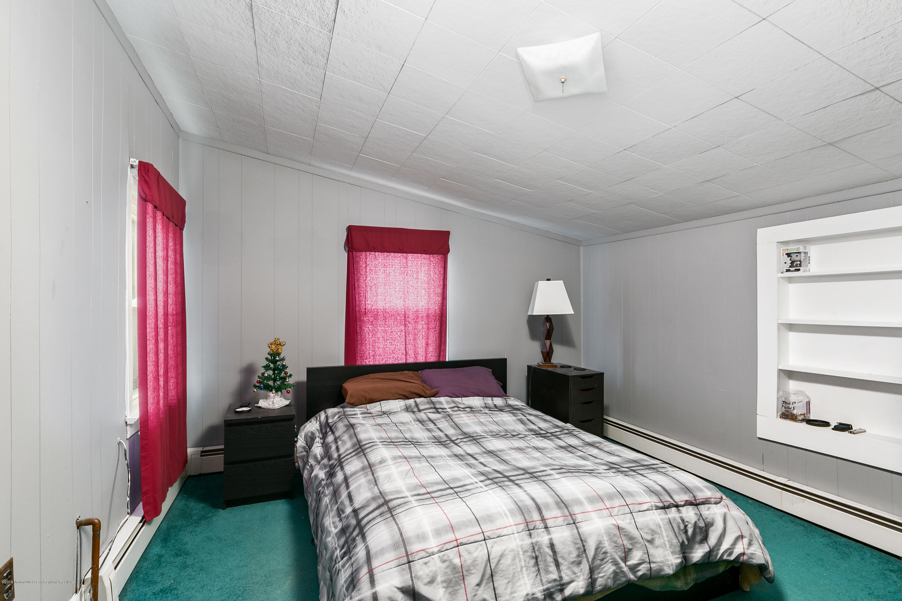 880 Monmouth Road Cream Ridge, NJ 08514 - Photo 31 of 45 a bedroom with a bed and a window