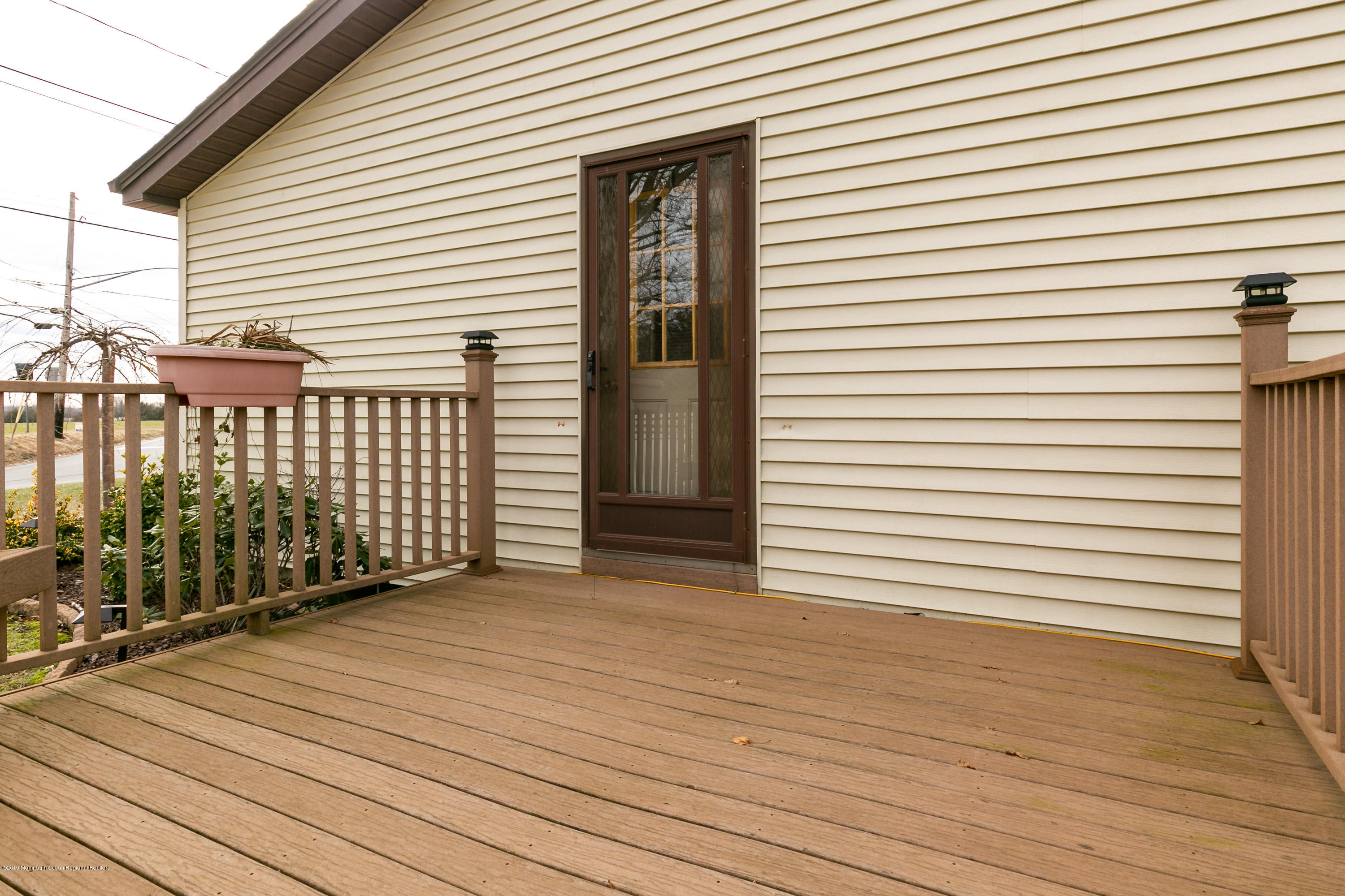 880 Monmouth Road Cream Ridge, NJ 08514 - Photo 41 of 45 a view of a wooden deck