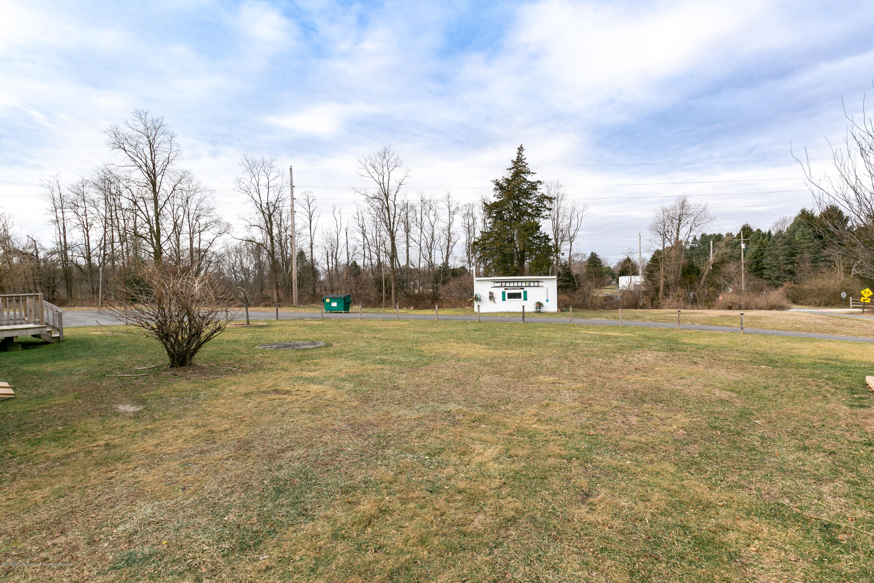 880 Monmouth Road Cream Ridge, NJ 08514 - Photo 45 of 45 a view of outdoor space with playground and trees