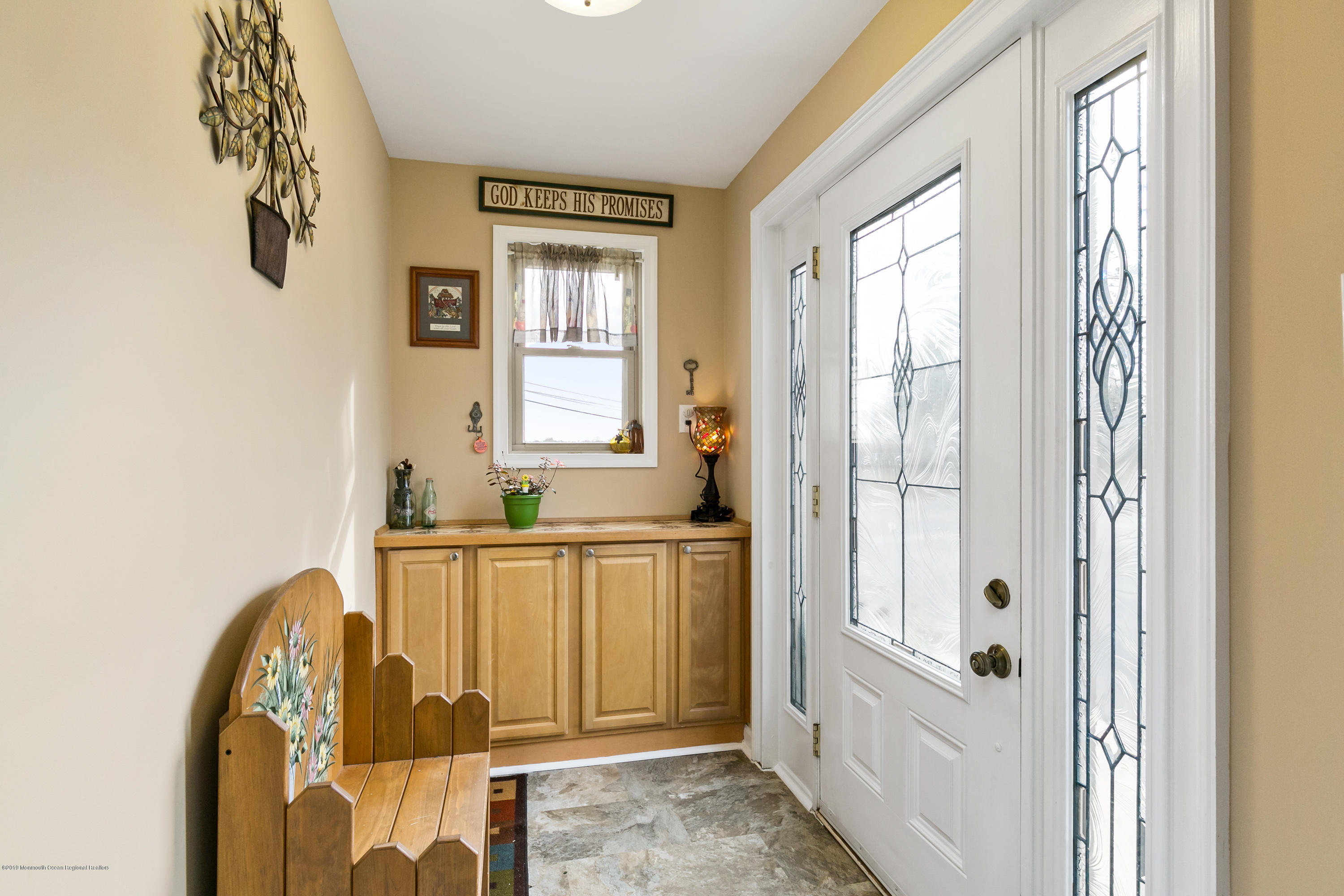 880 Monmouth Road Cream Ridge, NJ 08514 - Photo 8 of 45 a view of a bathroom with a tub and windows
