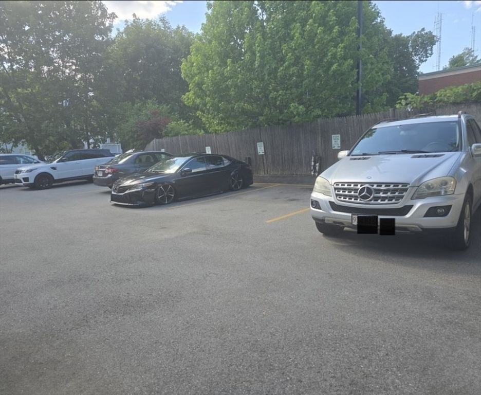 567 Main Street, Unit 2 Shrewsbury, MA 01545 - Photo 7 of 7 a car parked in a parking lot