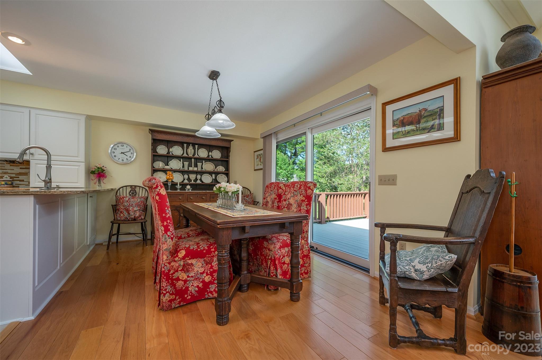 900 Club Road Tryon, NC 28782 - Photo 13 of 48 a view of a dining room with furniture window and wooden floor