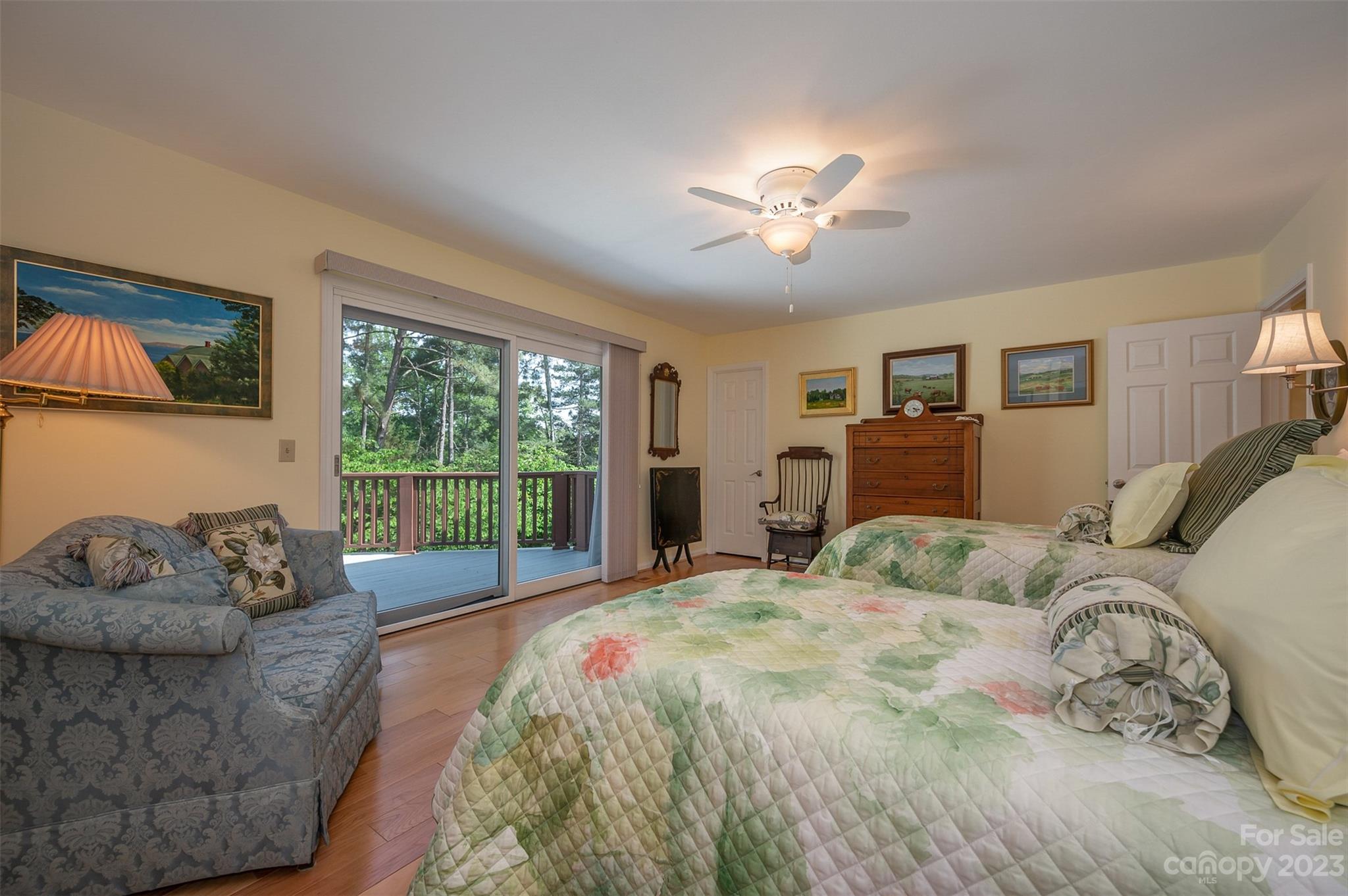 900 Club Road Tryon, NC 28782 - Photo 16 of 48 a bedroom with a bed and a couch