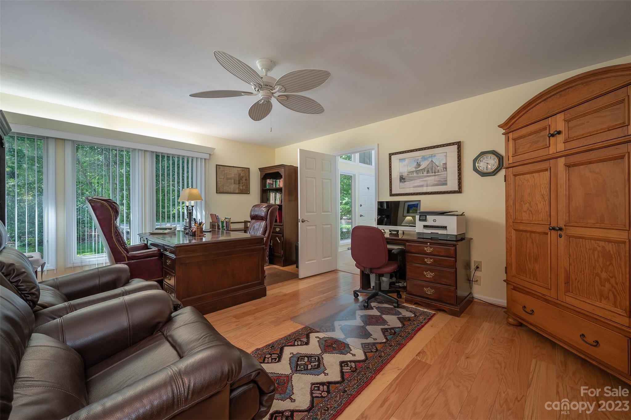 900 Club Road Tryon, NC 28782 - Photo 20 of 48 a living room with furniture a large window with wooden floor