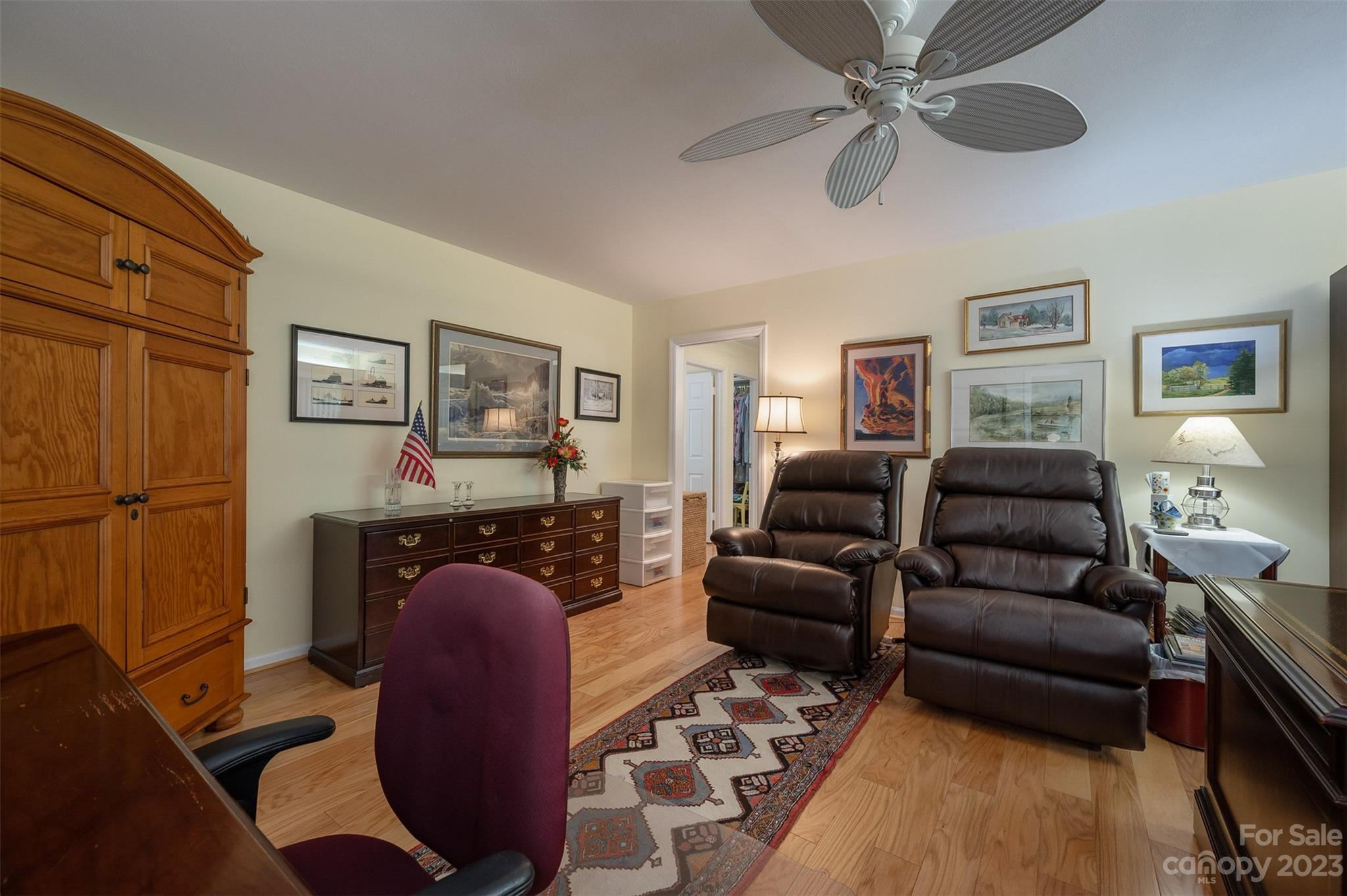 900 Club Road Tryon, NC 28782 - Photo 21 of 48 a living room with furniture a ceiling fan and a rug