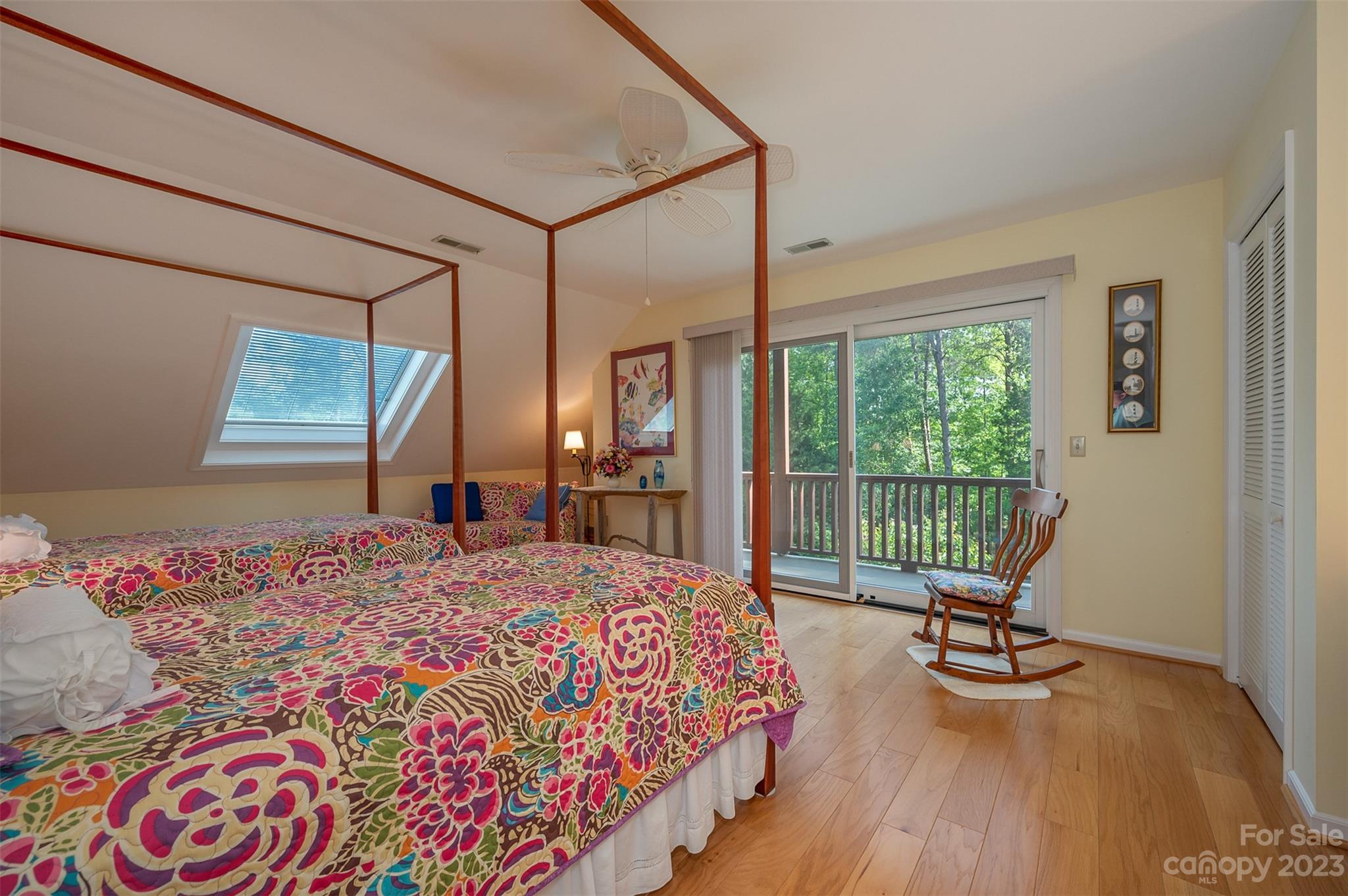 900 Club Road Tryon, NC 28782 - Photo 23 of 48 a bed sitting in a bedroom next to a window