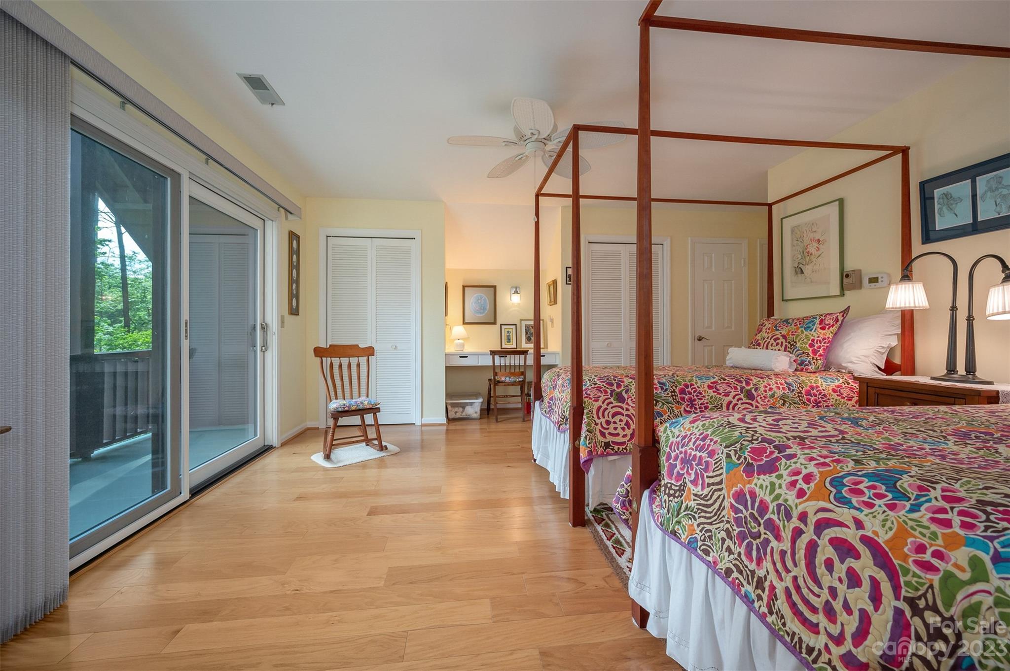 900 Club Road Tryon, NC 28782 - Photo 24 of 48 a bedroom with double bed and wooden floor