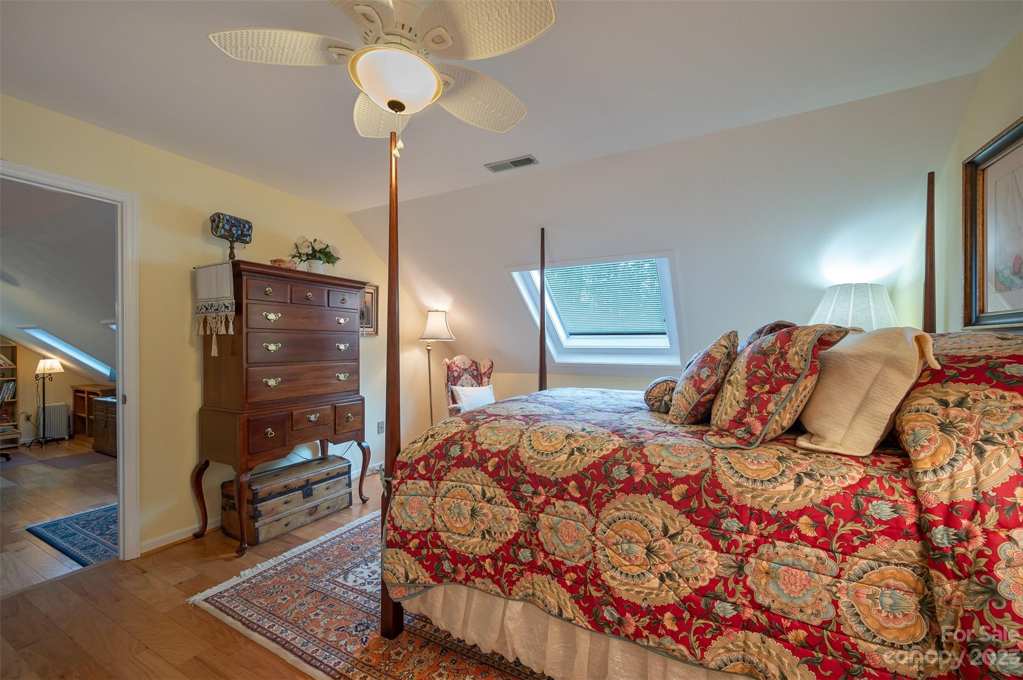 900 Club Road Tryon, NC 28782 - Photo 26 of 48 a bedroom with a bed and wooden floor