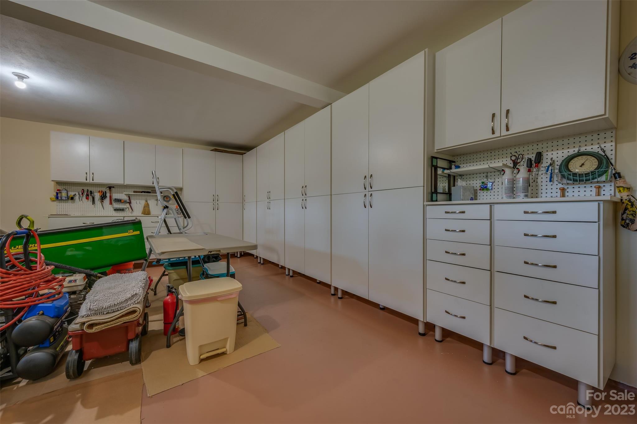 900 Club Road Tryon, NC 28782 - Photo 40 of 48 a storage room with cabinets