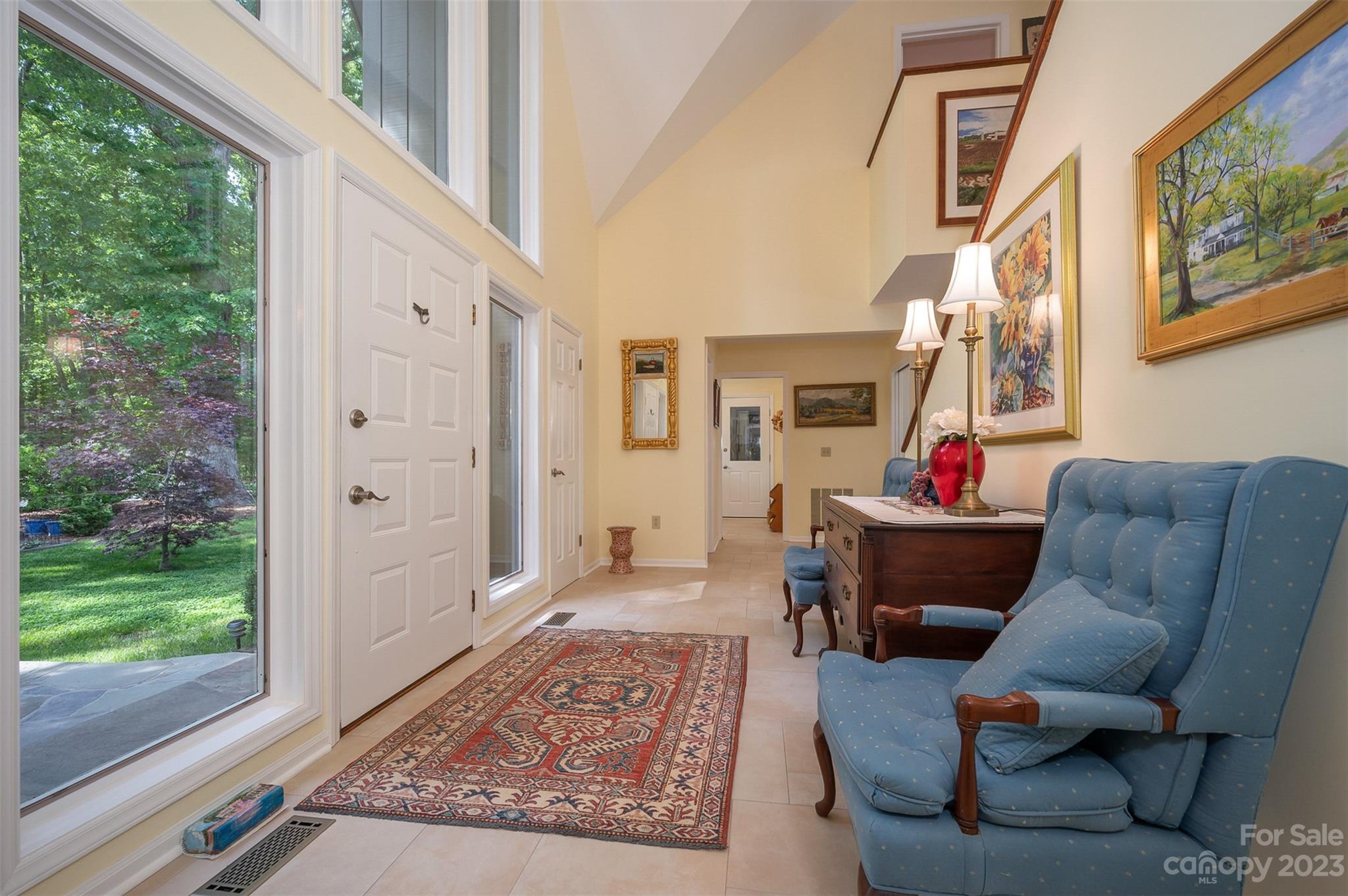 900 Club Road Tryon, NC 28782 - Photo 4 of 48 a living room with furniture and a wooden floor