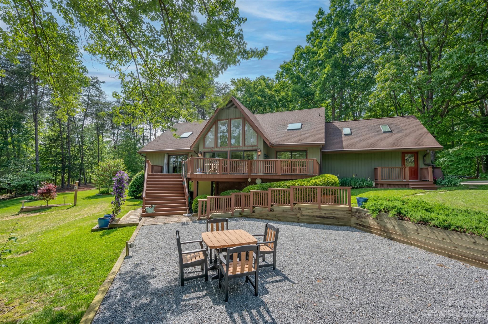 900 Club Road Tryon, NC 28782 - Photo 43 of 48 a view of a house with a yard patio and slide