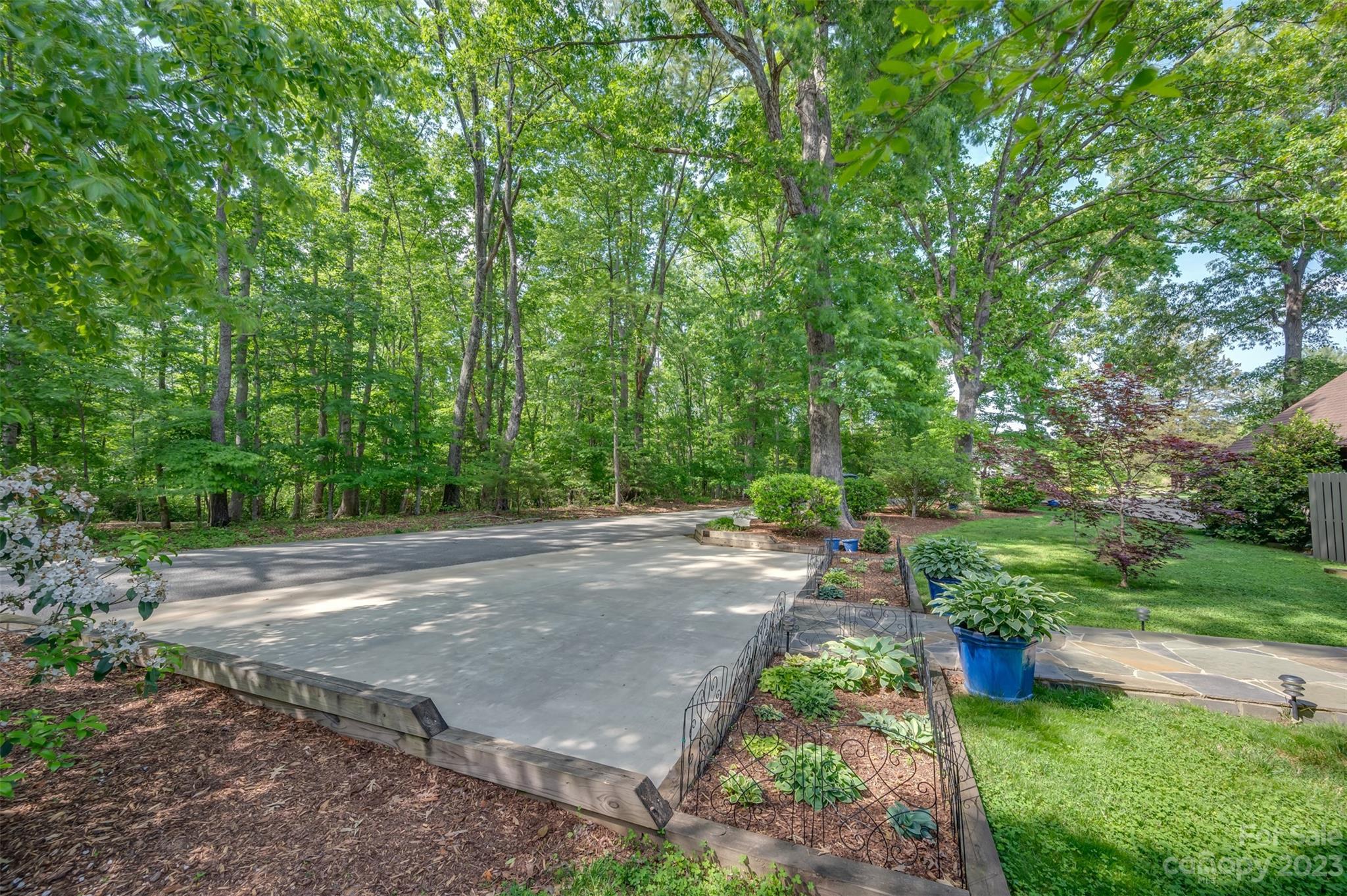 900 Club Road Tryon, NC 28782 - Photo 48 of 48 a view of a street with a yard and large trees
