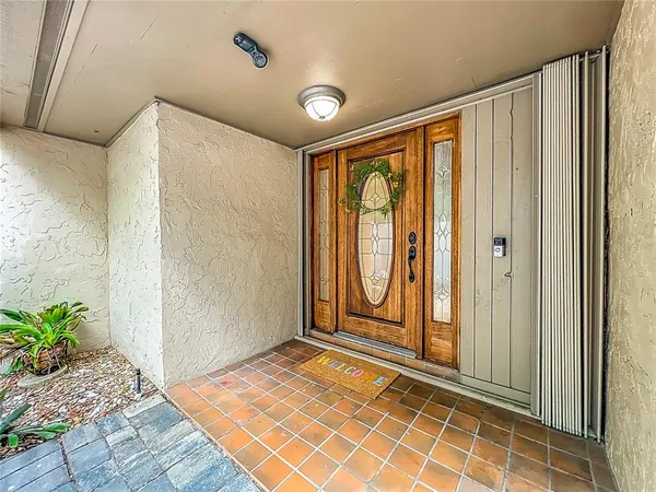 a view of an empty room with a sliding door