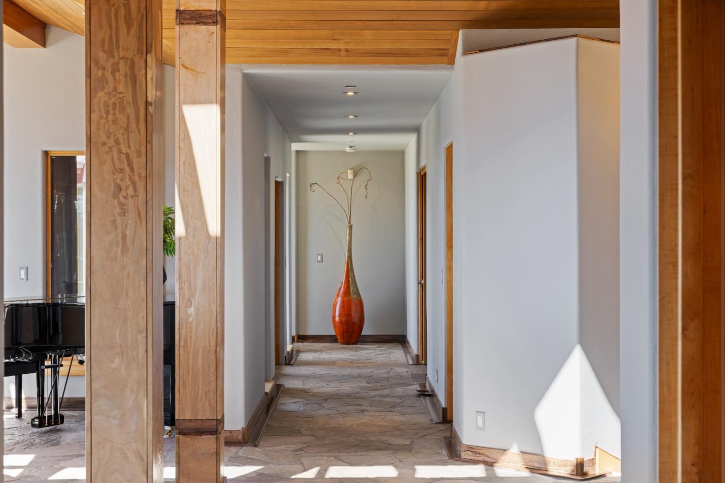 31475 Highway 1 Carmel, CA 93923 - Photo 17 of 43 a view of a hallway with wooden floor and closet