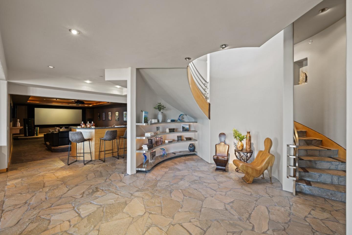 31475 Highway 1 Carmel, CA 93923 - Photo 29 of 43 a view of a hallway with a table and chairs