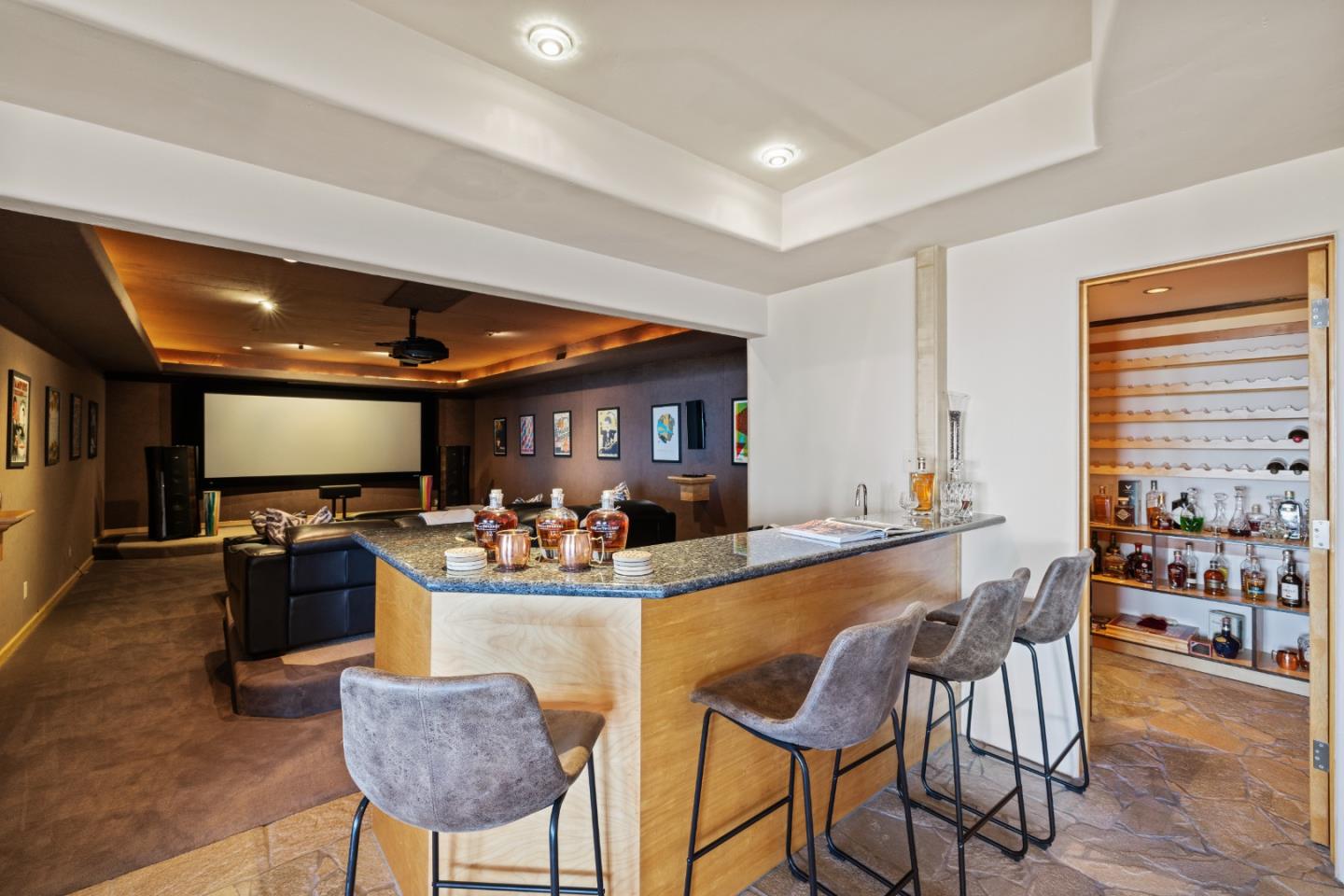 31475 Highway 1 Carmel, CA 93923 - Photo 31 of 43 a dining room with furniture and a flat screen tv