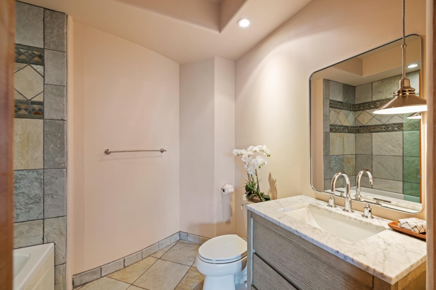 31475 Highway 1 Carmel, CA 93923 - Photo 41 of 43 a bathroom with a sink toilet and shower