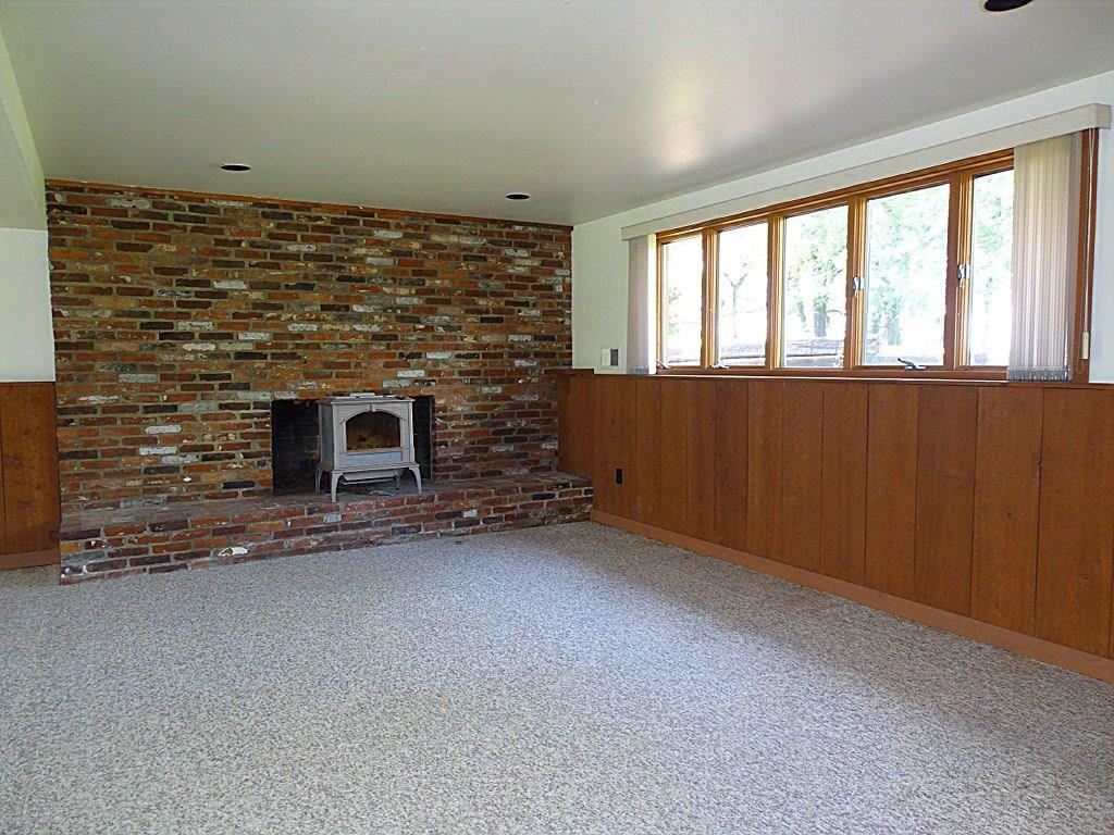 82 McBride Road Canonsburg, PA 15317 - Photo 16 of 25 Lower level family room with fireplace/woodburner