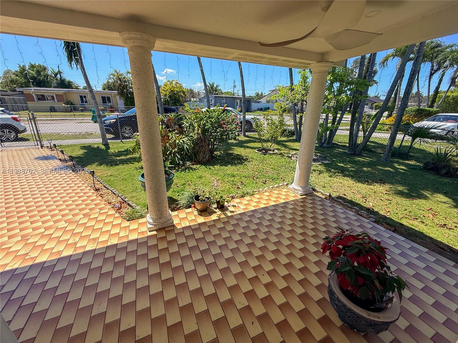 9971 Southwest 41st Terrace Miami, FL 33165 - Photo 18 of 21 a view of a backyard with sitting area