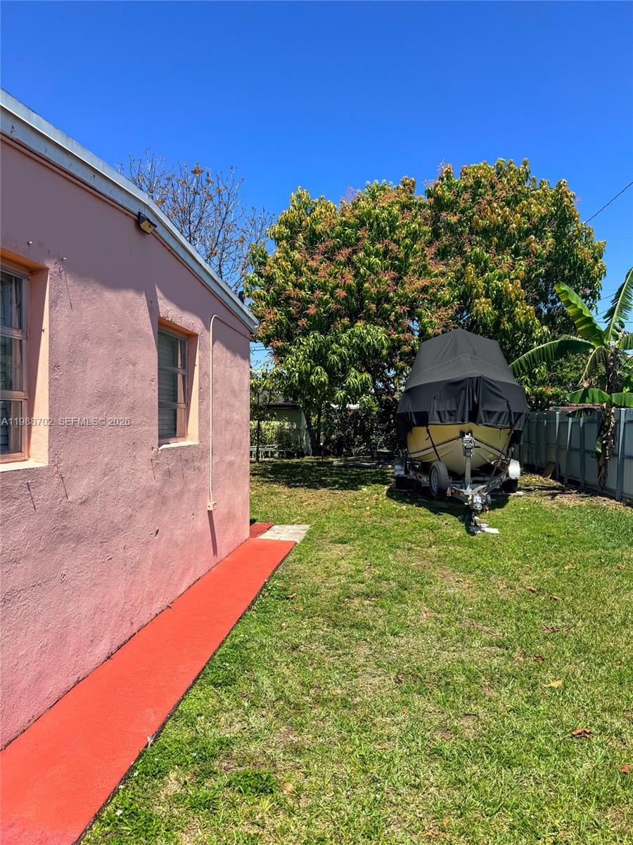 9971 Southwest 41st Terrace Miami, FL 33165 - Photo 19 of 21 a view of a house with backyard and sitting area