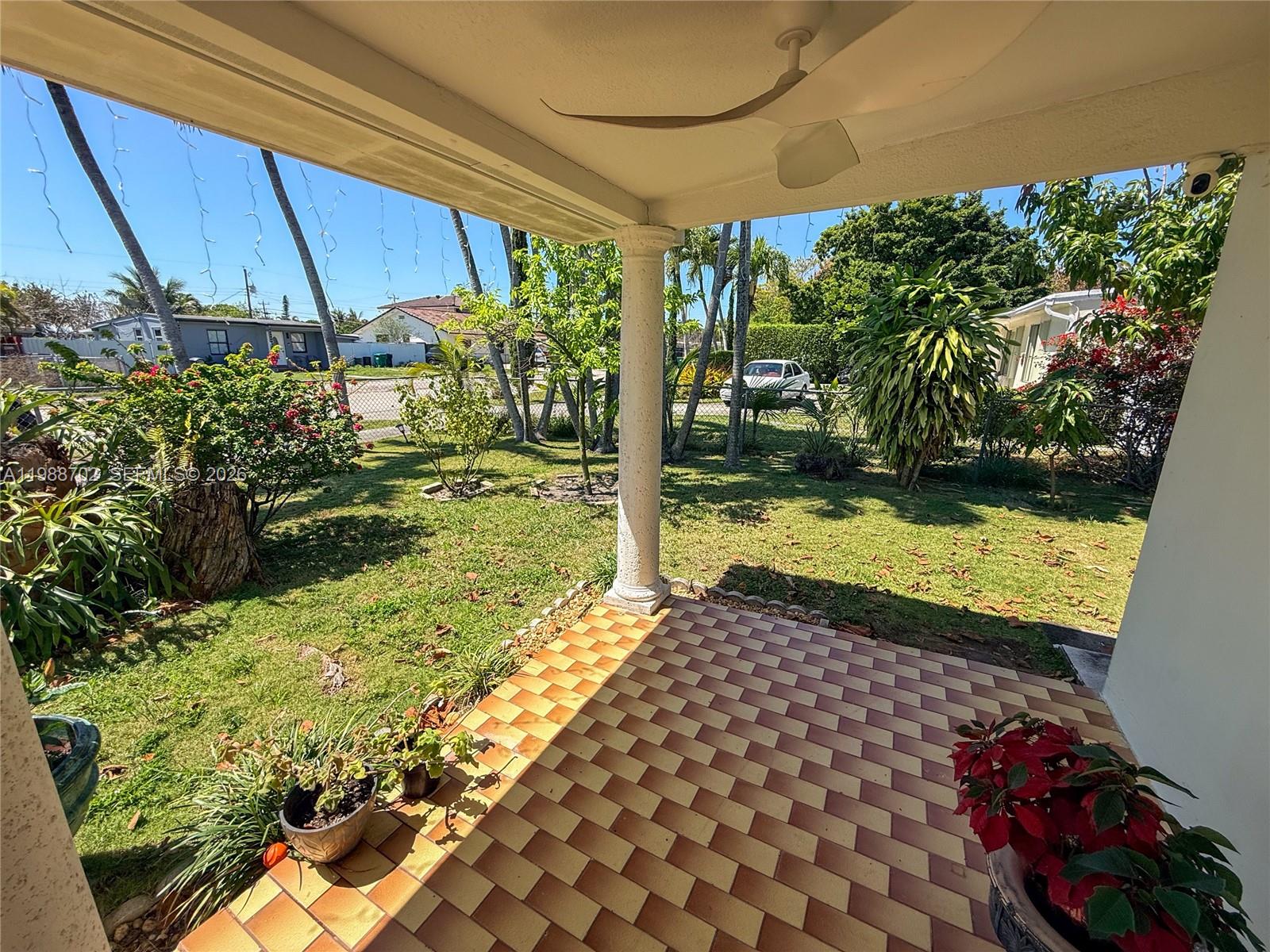 9971 Southwest 41st Terrace Miami, FL 33165 - Photo 3 of 21 a view of a backyard